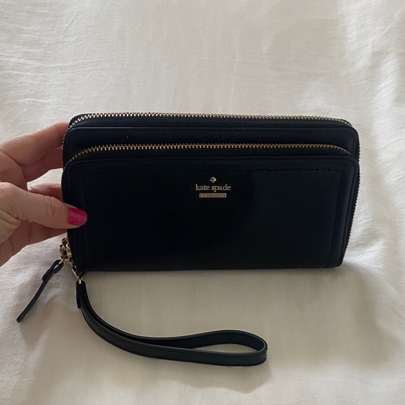 kate spade Handbags - Kate Spade Black Wristlet with Gold Accents